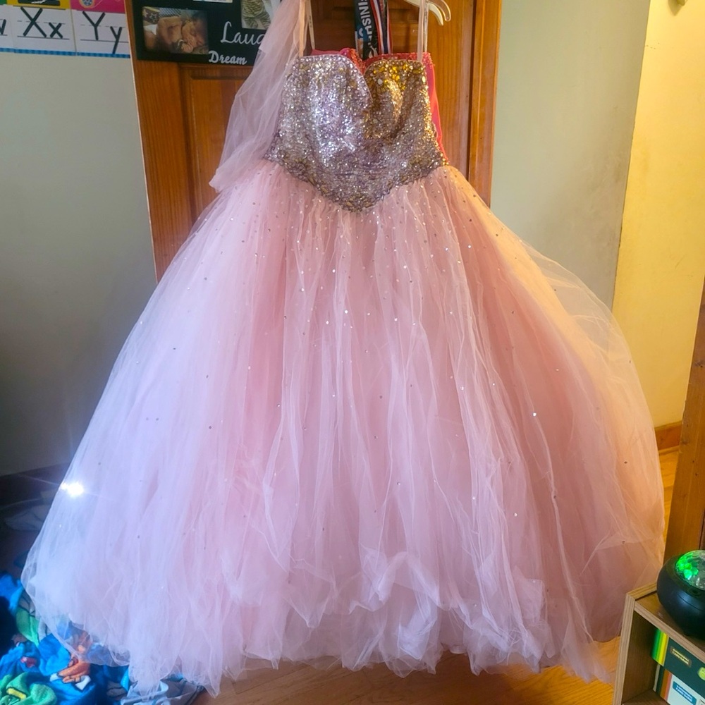 Sequin sweetheart neck line with chiffon skirt. One piece ballroom dress